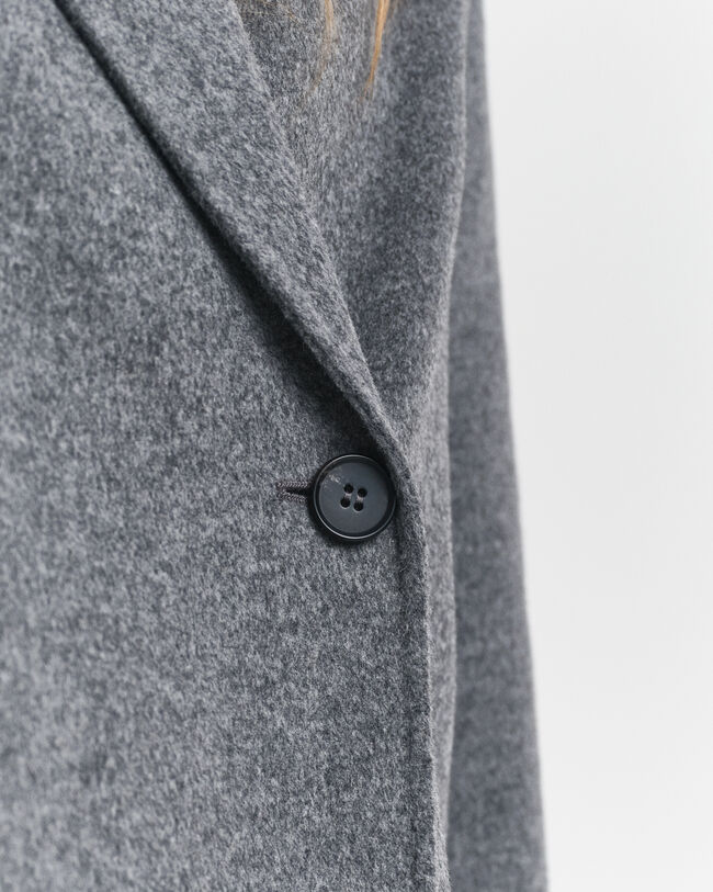 Handsydd jacka med b&auml;lte