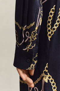 M&ouml;nstrad skjortkl&auml;nning