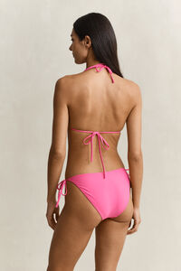 Bikintrosor med knytband i sidan