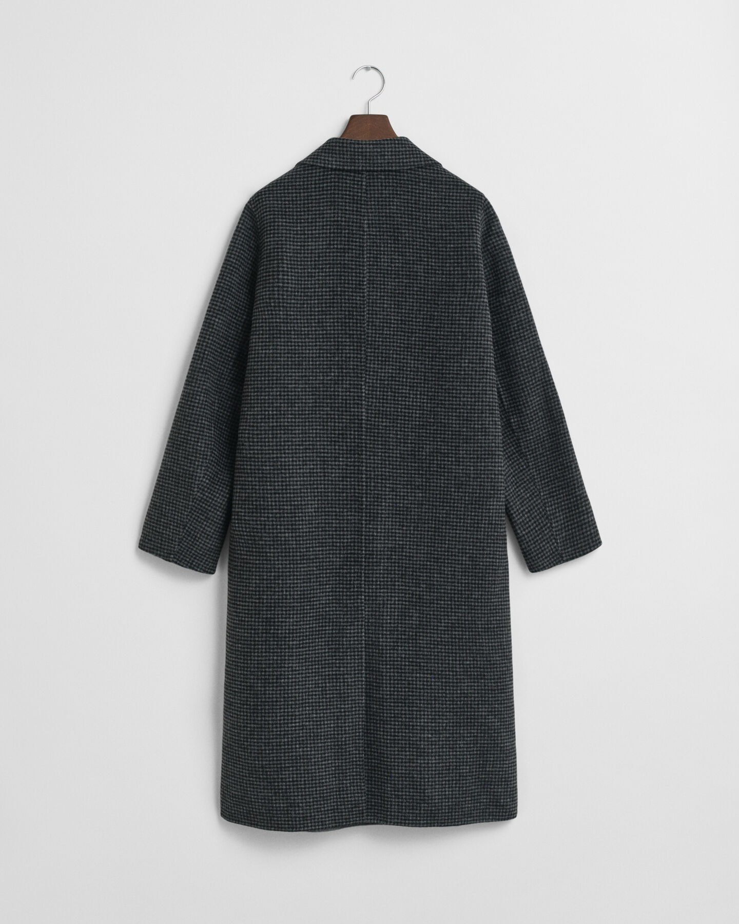 Rutig kappa med handsydda detaljer