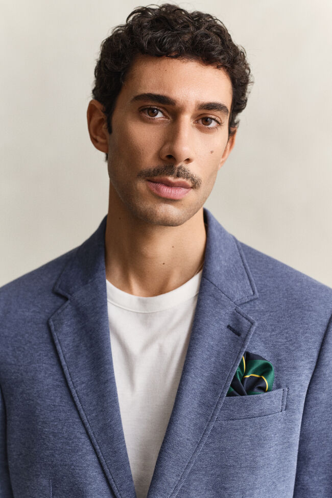 Tv&aring;f&auml;rgad kavaj i jerseypik&eacute;