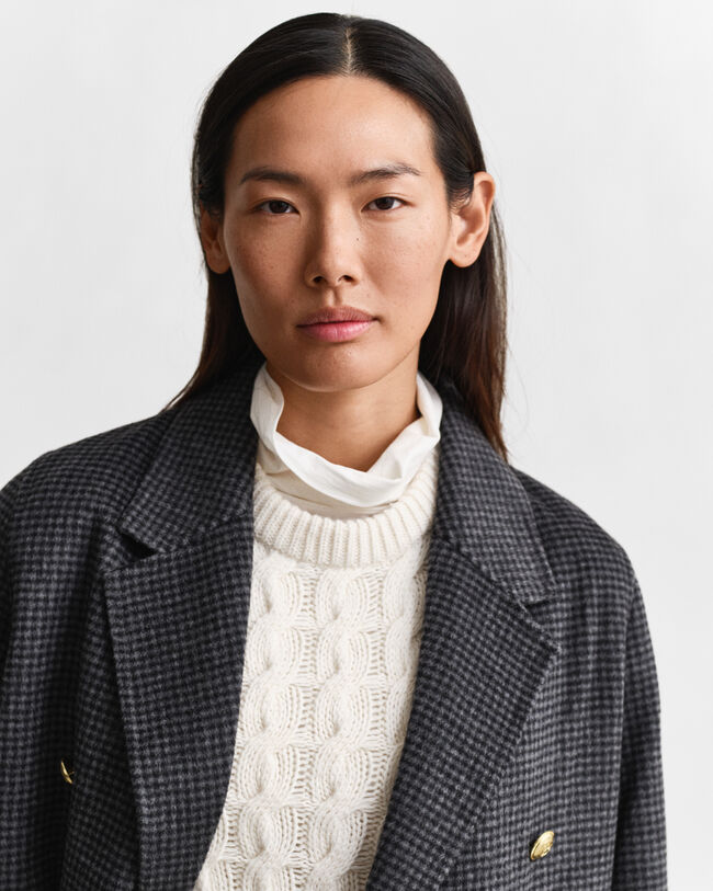 Rutig kappa med handsydda detaljer