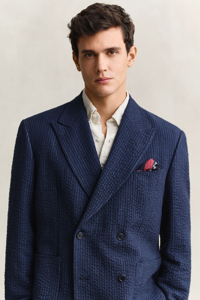 Indigof&auml;rgad kavaj i b&auml;ckeb&ouml;lja