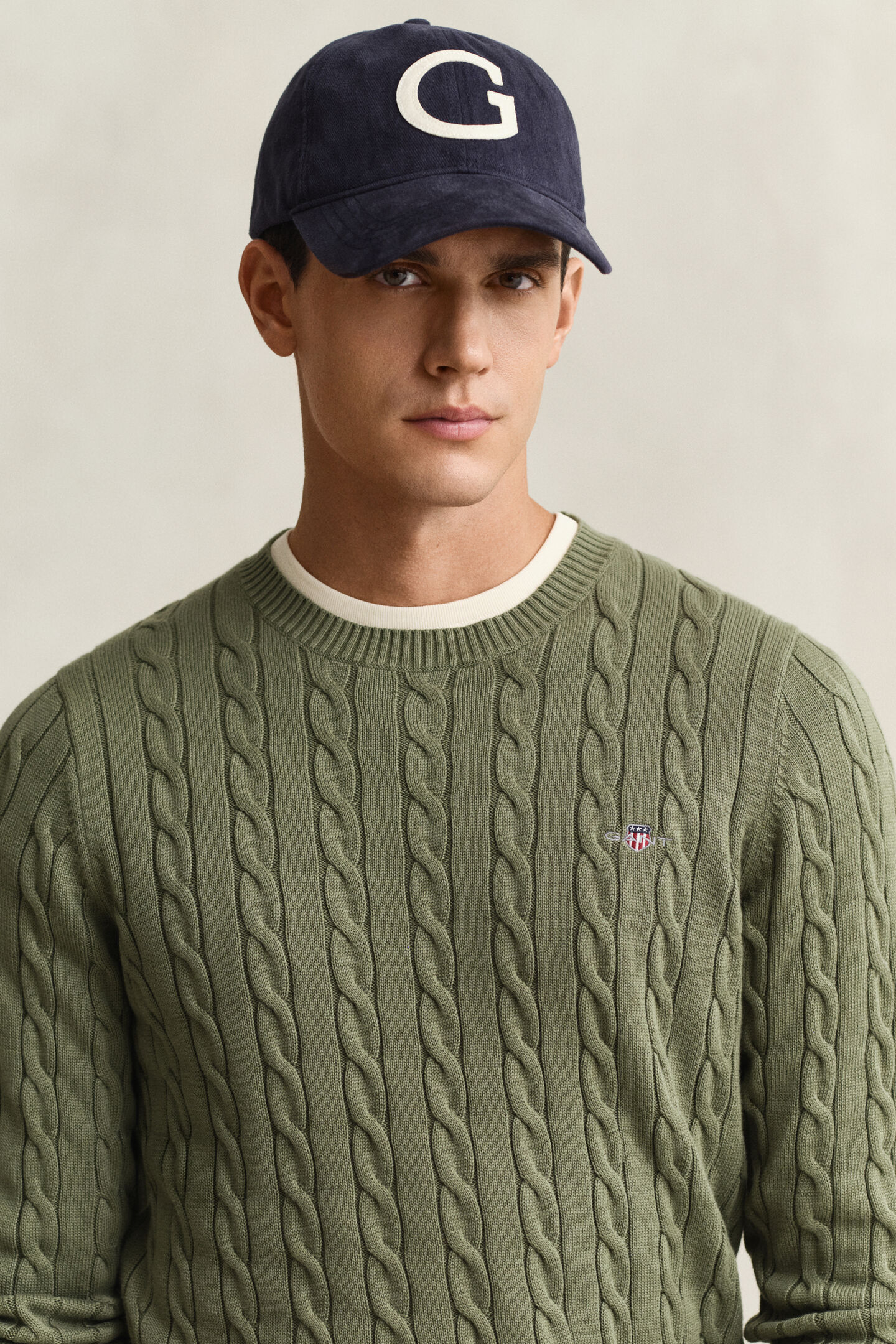 Kabelstickad bomullstr&ouml;ja med rund hals