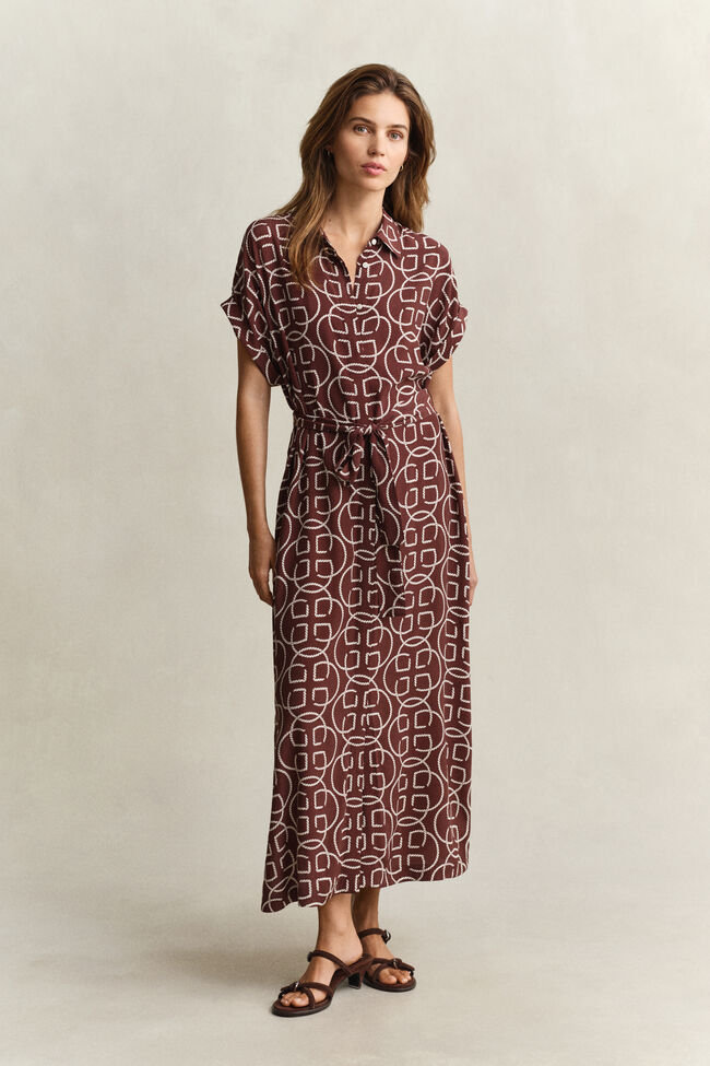 Kl&auml;nning med holk&auml;rm och monogram