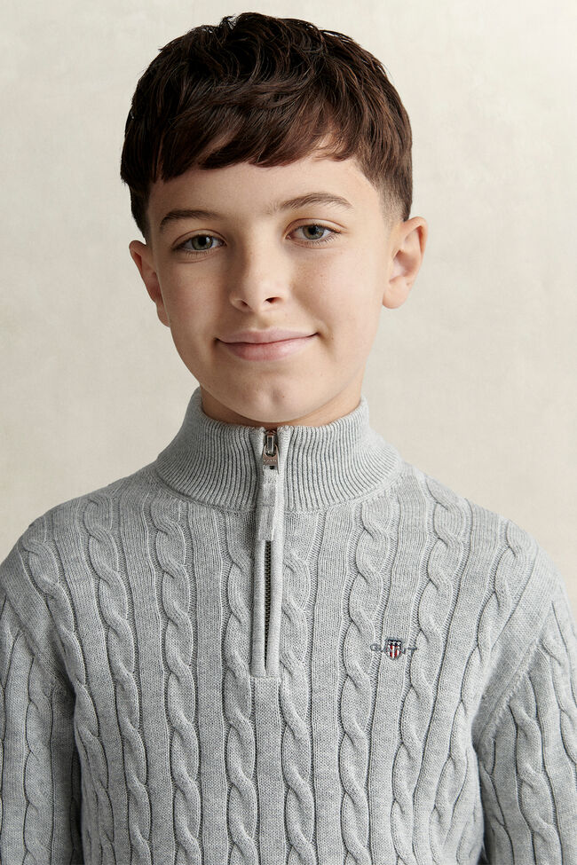 Teen Boys tr&ouml;ja med half-zip och sk&ouml;ldemblem