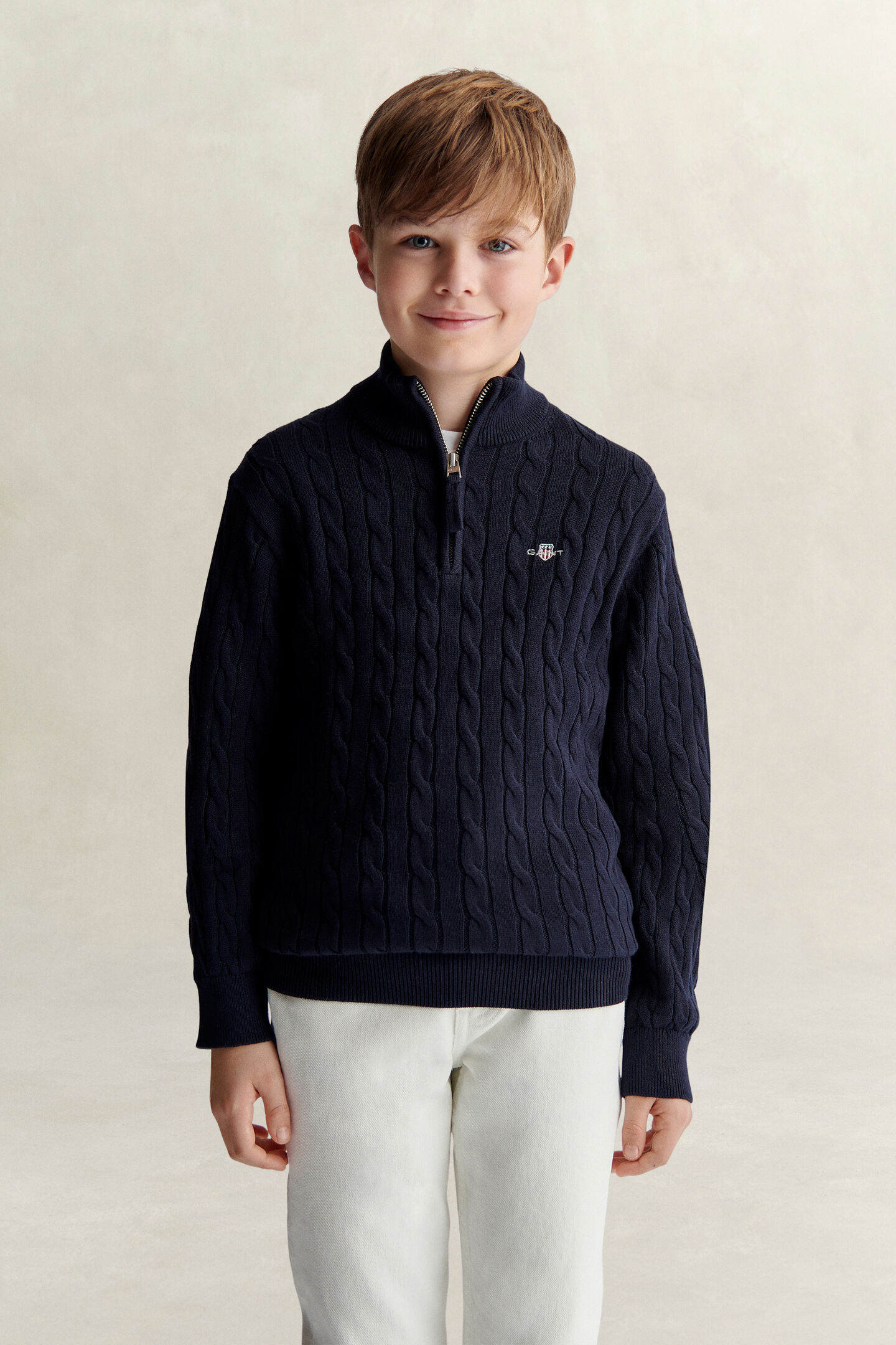 Teen Boys tr&ouml;ja med half-zip och sk&ouml;ldemblem