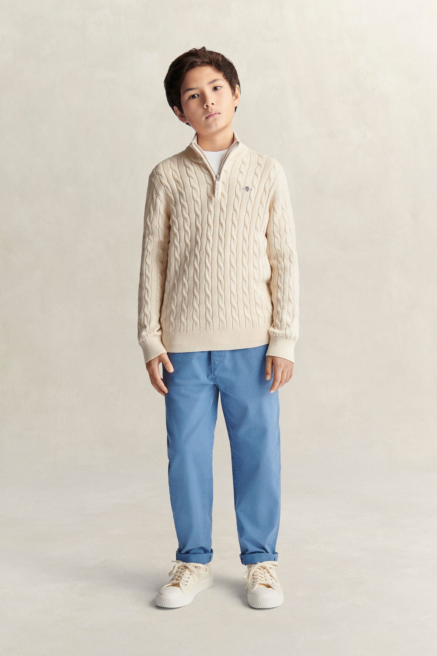 Teen Boys tr&ouml;ja med half-zip och sk&ouml;ldemblem