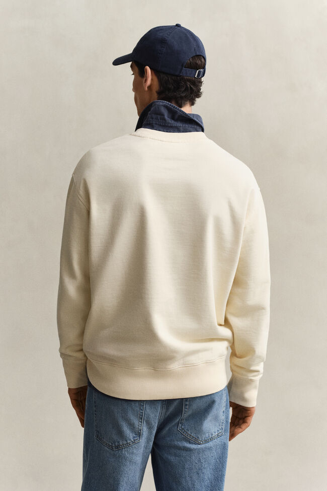 Sweatshirt med spraymotiv