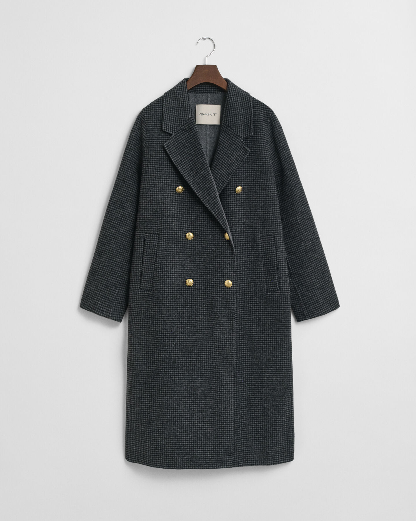 Rutig kappa med handsydda detaljer