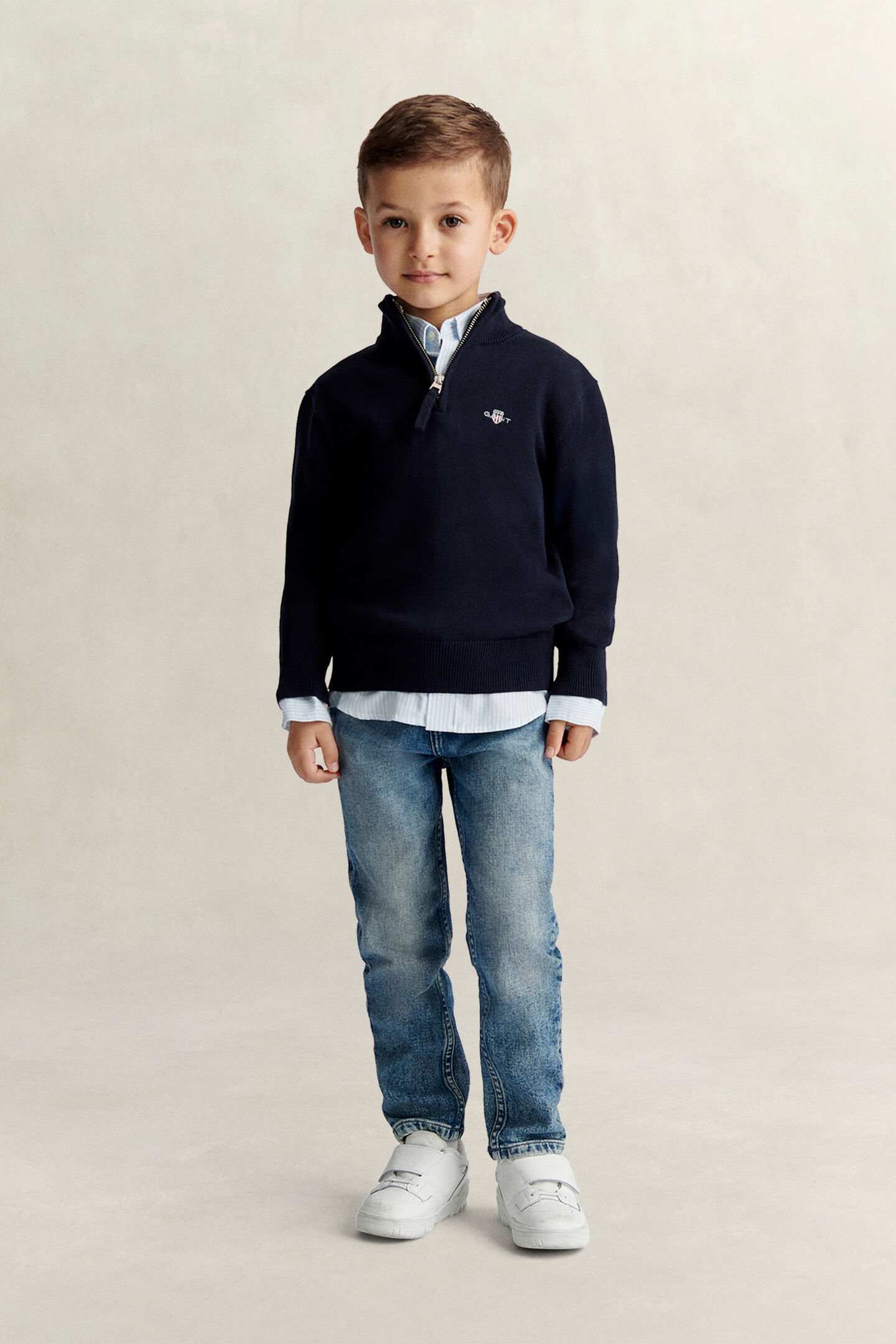 Boys tr&ouml;ja med half-zip och sk&ouml;ldemblem