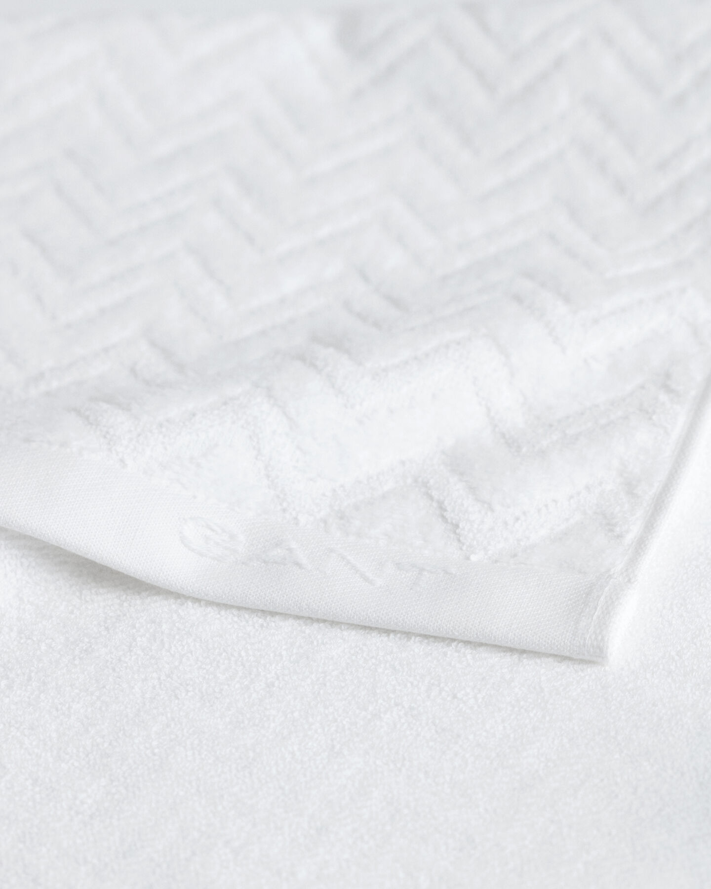 Jacquardv&auml;vd fiskbensm&ouml;nstrad handduk 50 x 70