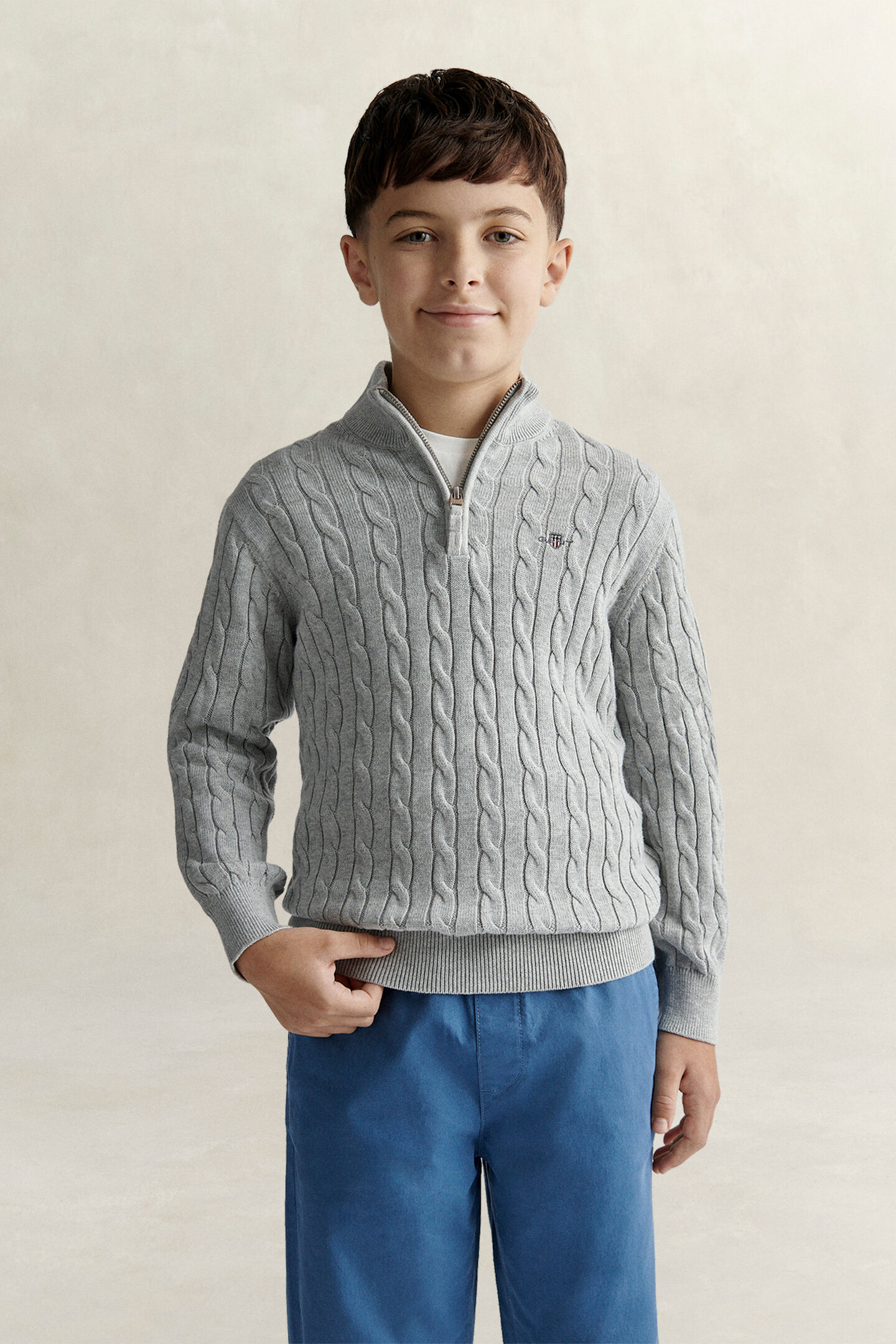 Teen Boys tr&ouml;ja med half-zip och sk&ouml;ldemblem