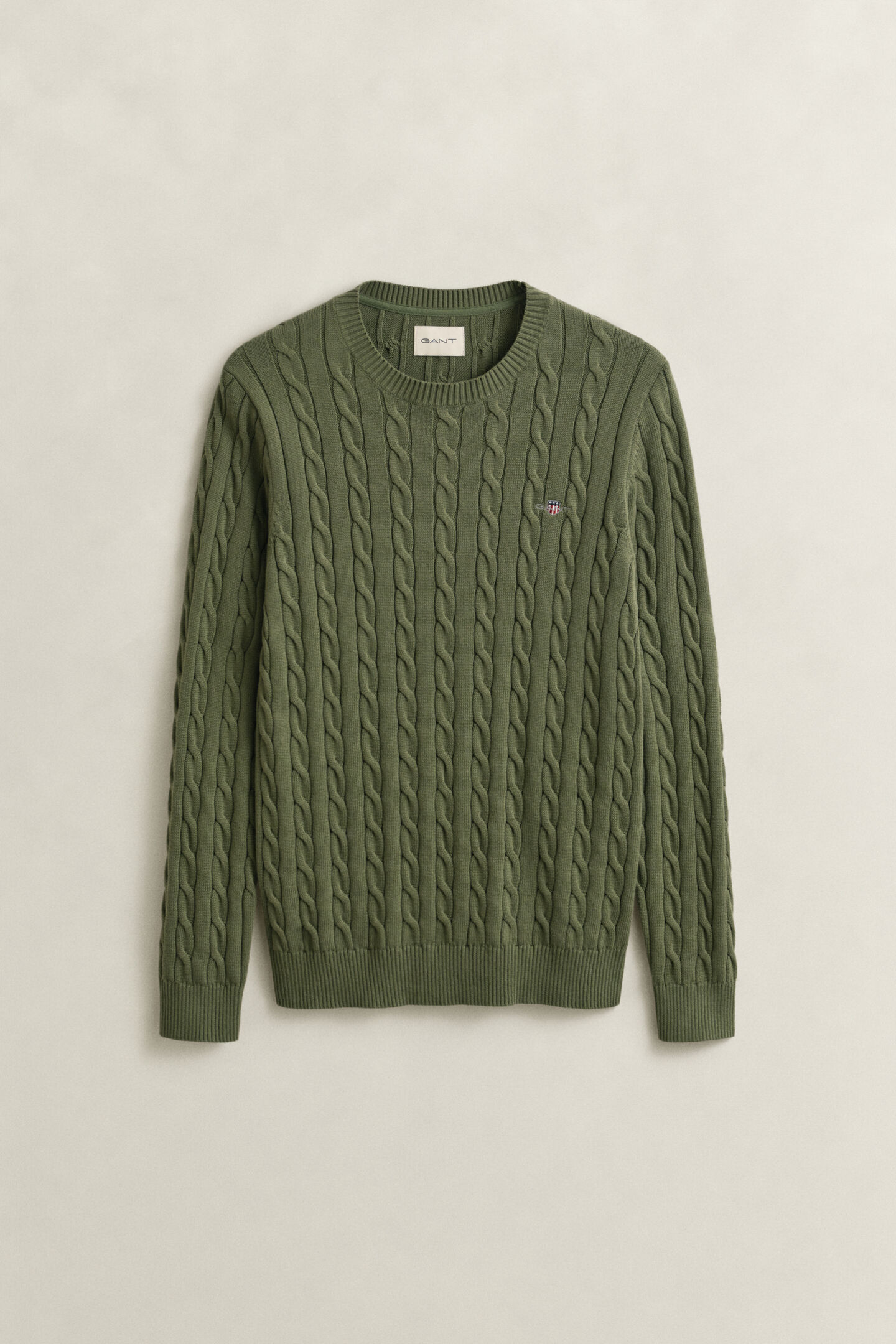 Kabelstickad bomullstr&ouml;ja med rund hals