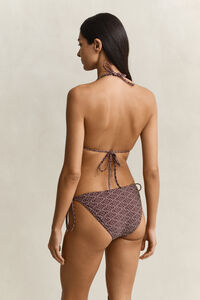 M&ouml;nstrade bikinitrosor med knytband i sidan