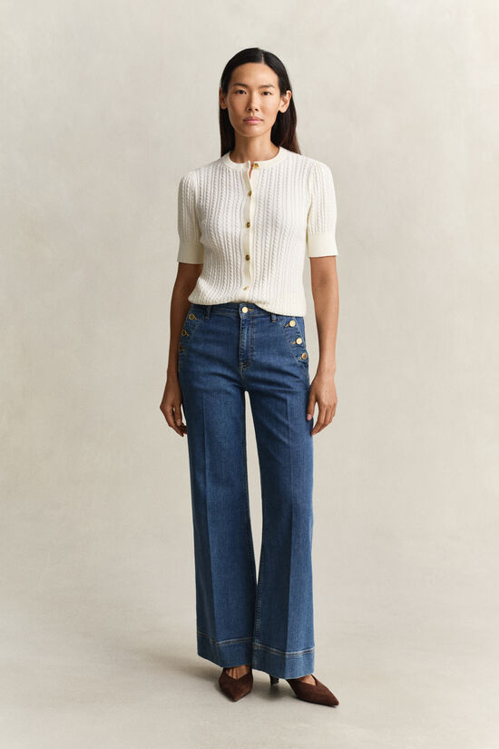 Utst&auml;llda jeans med marin k&auml;nsla