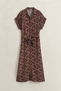 Kl&auml;nning med holk&auml;rm och monogram