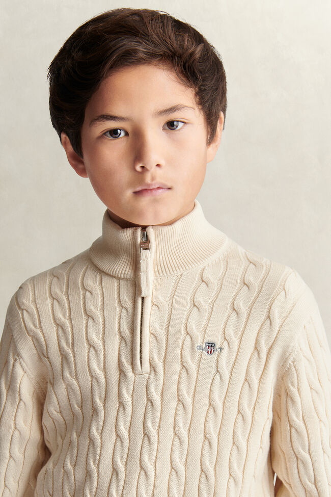 Teen Boys tr&ouml;ja med half-zip och sk&ouml;ldemblem