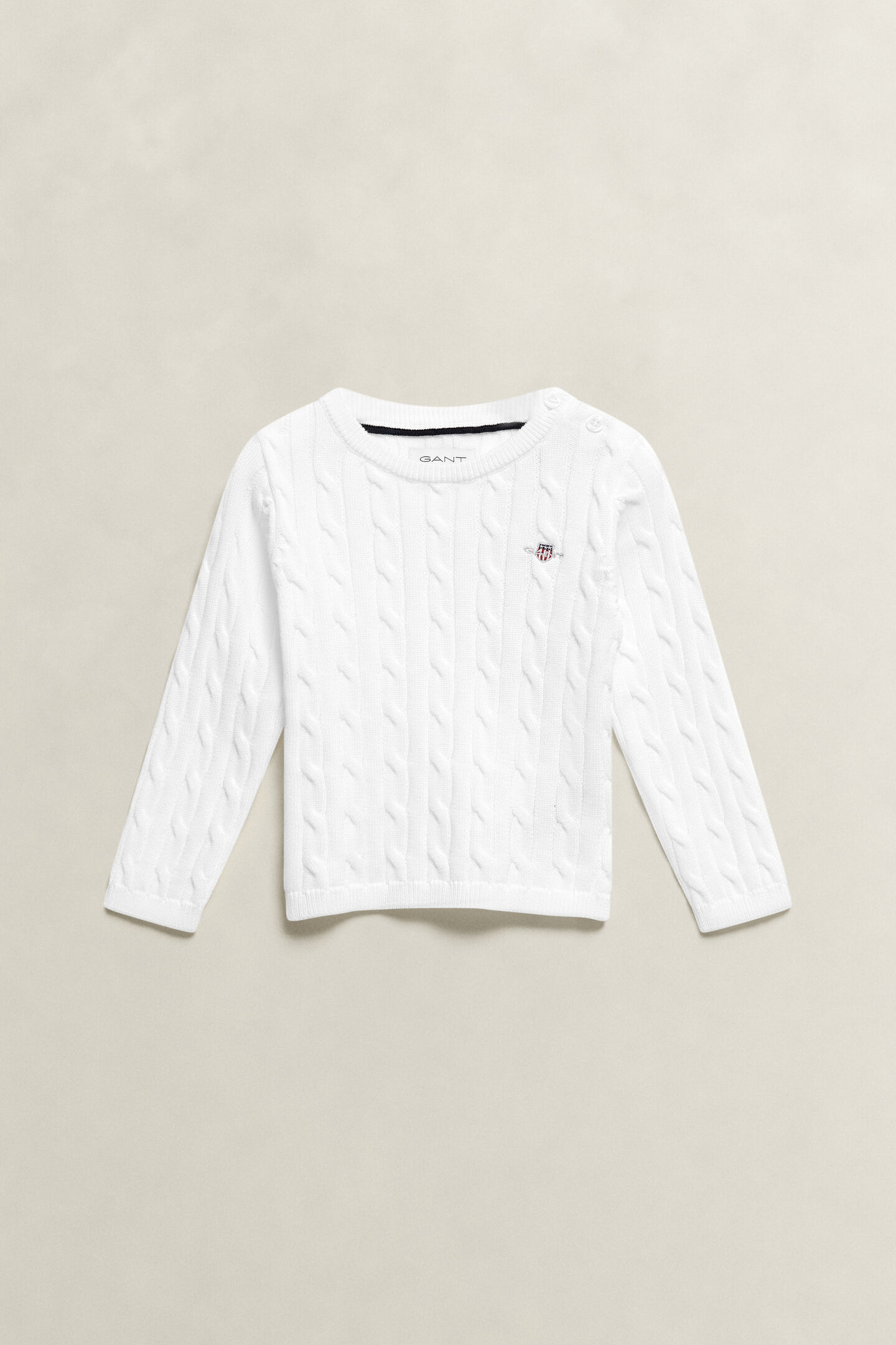 Girls kabelstickad tr&ouml;ja med sk&ouml;ldemblem