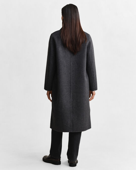 Rutig kappa med handsydda detaljer